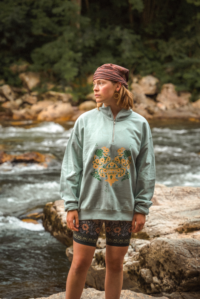 
                  
                    Faeries swimming in the green sea sweatshirt
                  
                